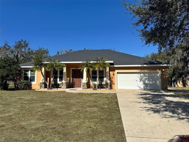 view of front facade featuring a porch, a garage, and a front yard