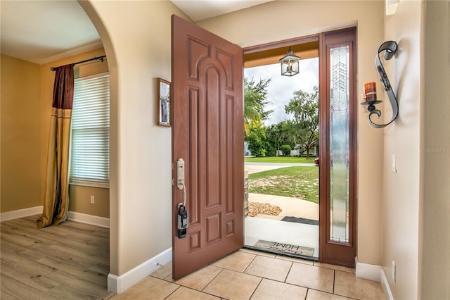 entrance foyer featuring light tile patterned floors