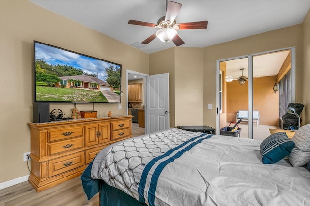 bedroom with light hardwood / wood-style floors, a closet, and ceiling fan