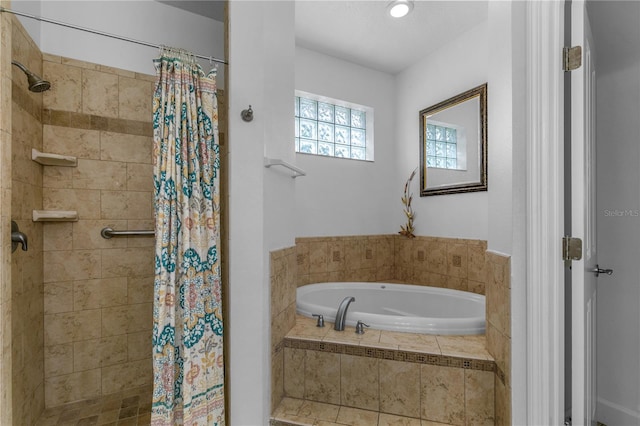 bathroom with independent shower and bath