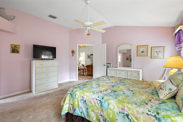 bedroom featuring lofted ceiling, light colored carpet, visible vents, a ceiling fan, and baseboards