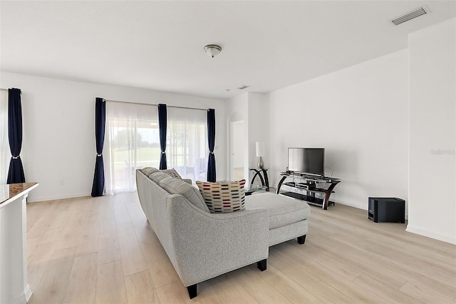 living room featuring light wood-type flooring