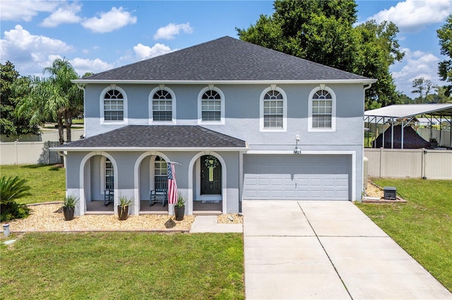 view of front of house with a garage and a front yard