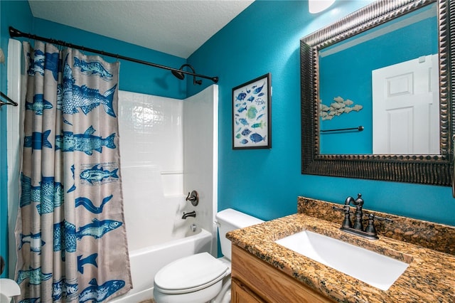 full bath featuring a textured ceiling, vanity, shower / bath combination with curtain, and toilet