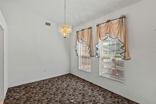 unfurnished dining area featuring carpet, vaulted ceiling, a notable chandelier, and plenty of natural light