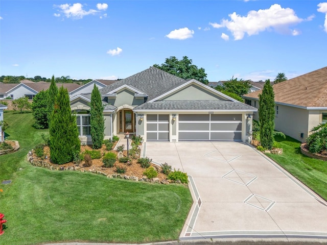 ranch-style house with a garage and a front yard