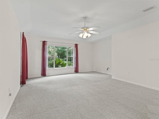 carpeted empty room with ceiling fan