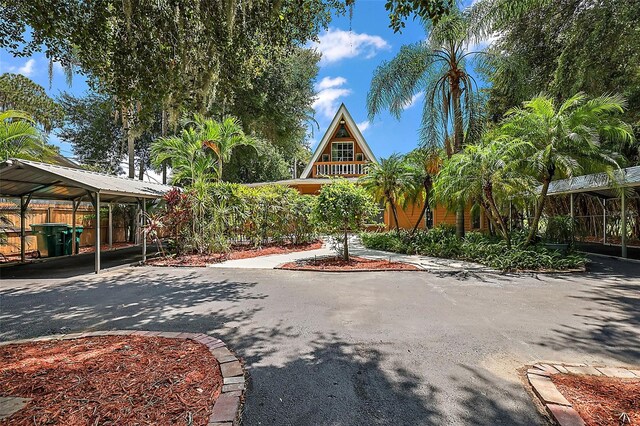 exterior space with a carport