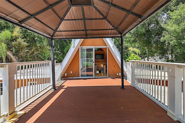 wooden terrace with a gazebo