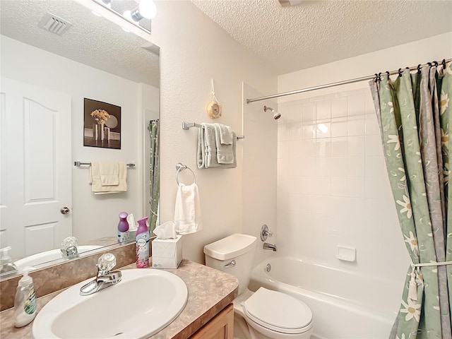 full bathroom with a textured ceiling, vanity, toilet, and shower / bath combo with shower curtain