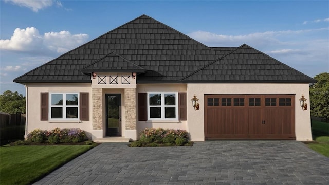 view of front of property featuring a garage