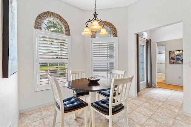 dining area featuring light wood-type flooring