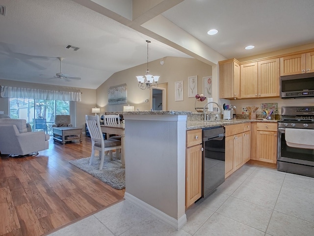 kitchen featuring visible vents, appliances with stainless steel finishes, open floor plan, a peninsula, and light brown cabinets