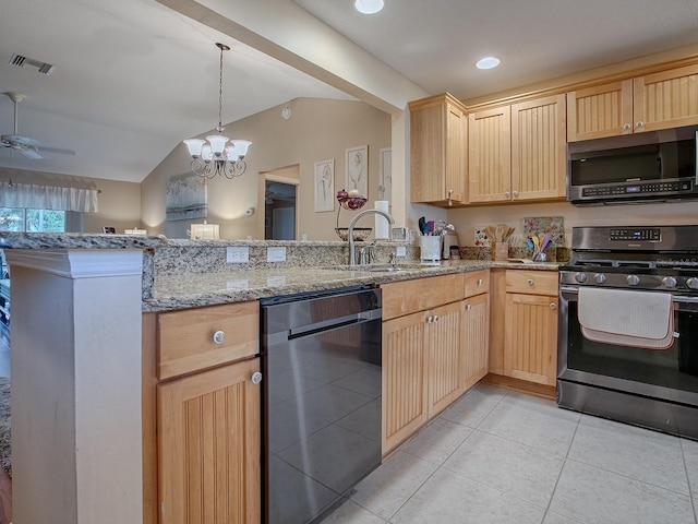 kitchen with stainless steel appliances, a peninsula, a sink, visible vents, and light brown cabinetry