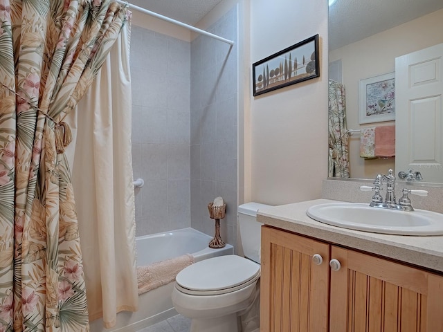 full bathroom featuring shower / bath combo, vanity, and toilet