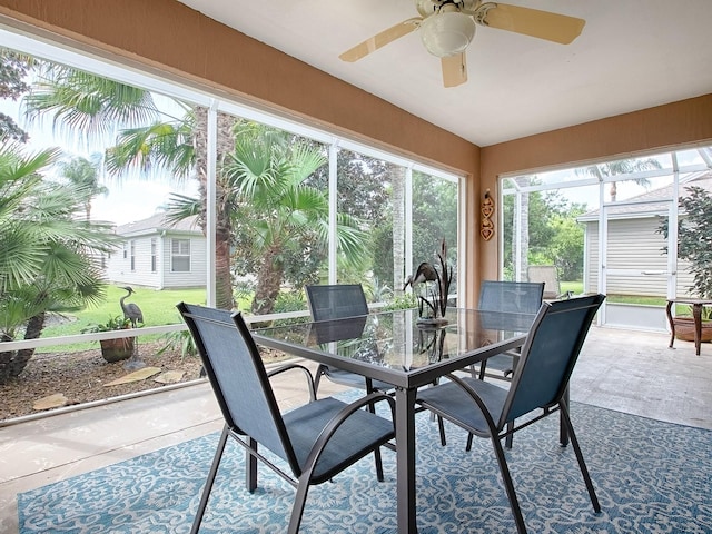 sunroom / solarium with ceiling fan