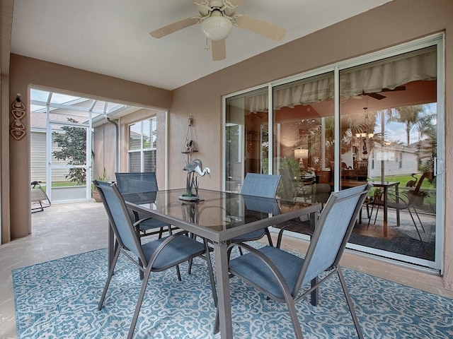 sunroom with ceiling fan