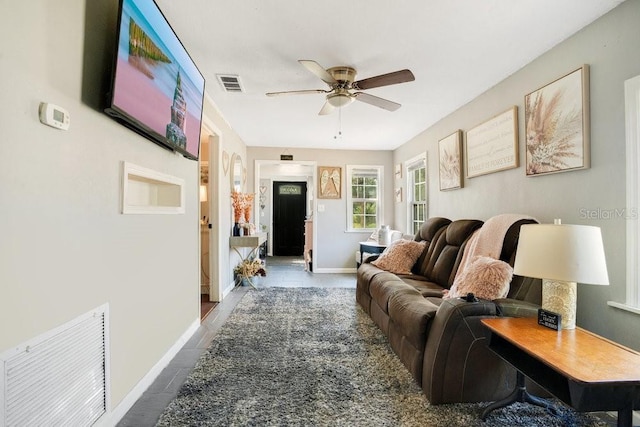 living room featuring ceiling fan