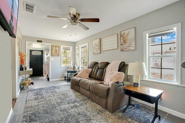 living room with ceiling fan