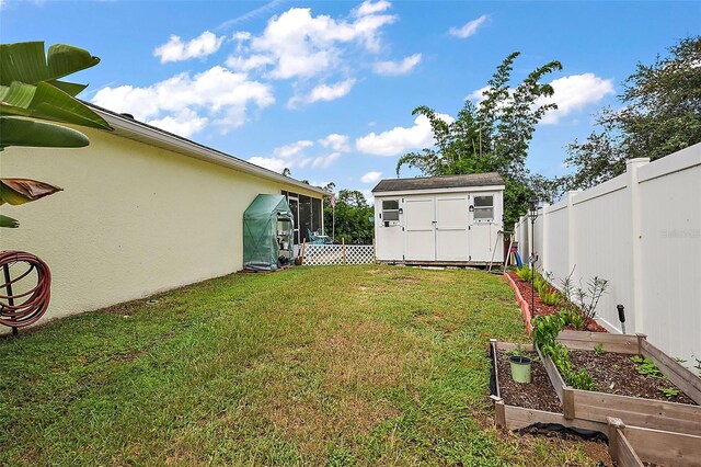 view of yard with a storage shed