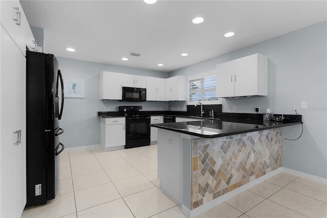 kitchen with white cabinetry, sink, kitchen peninsula, and black appliances