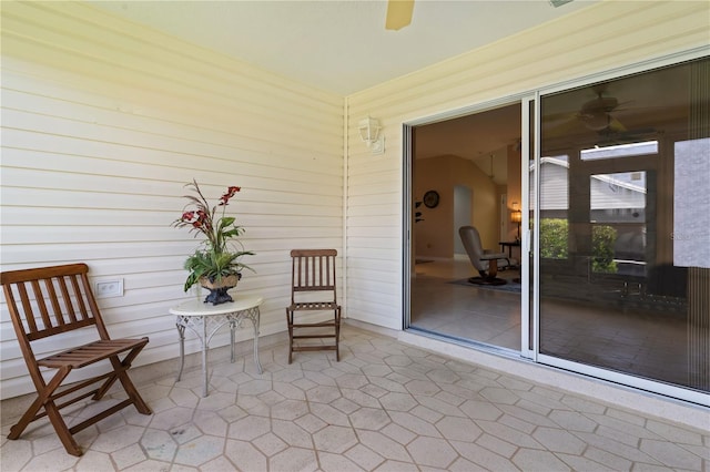 view of patio / terrace featuring ceiling fan