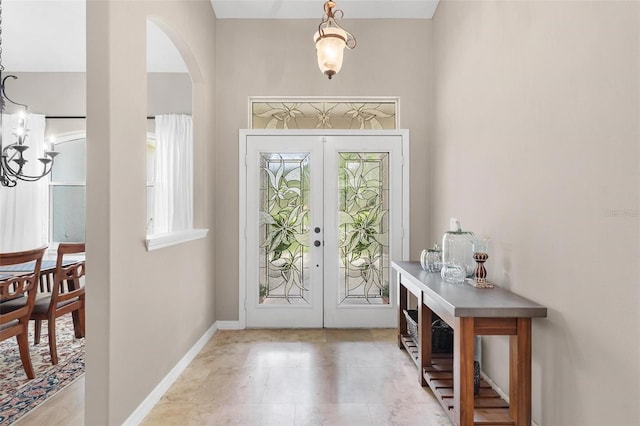 entrance foyer featuring french doors