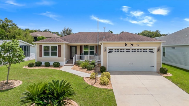 ranch-style home with a porch, an attached garage, concrete driveway, roof with shingles, and a front lawn