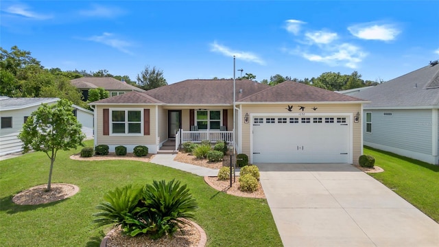 ranch-style home with a porch, a front yard, and a garage