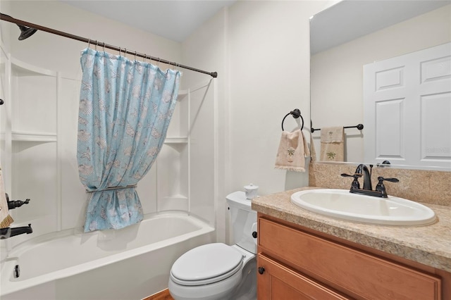 full bath with shower / bathtub combination with curtain, vanity, and toilet