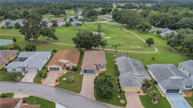 32915 Crooked Oaks Ln, Leesburg, FL 34748 - drone / aerial view featuring golf course view and a residential view