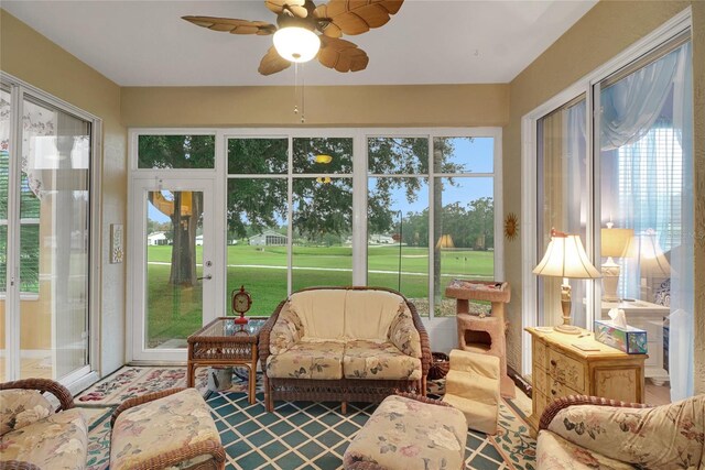 32915 Crooked Oaks Ln, Leesburg, FL 34748 - sunroom featuring ceiling fan