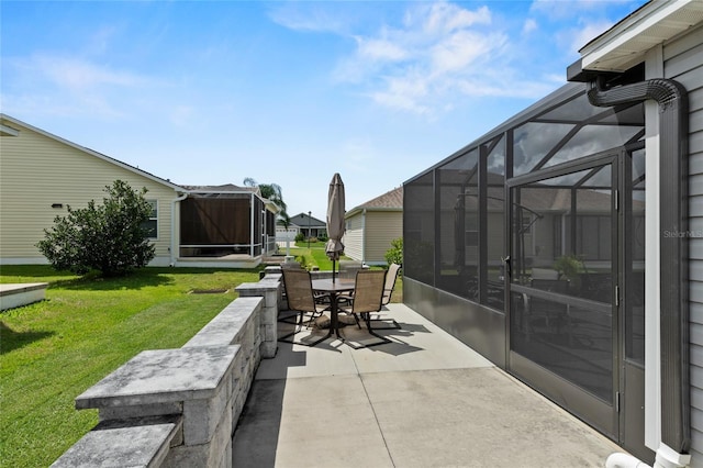 view of patio / terrace with a lanai