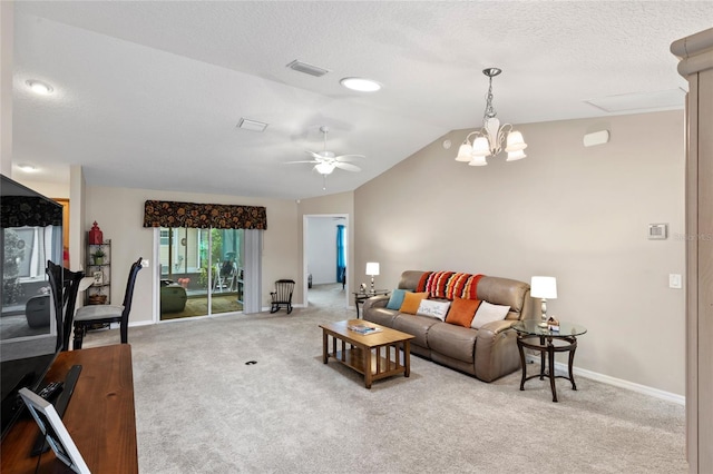 living area featuring lofted ceiling, light colored carpet, visible vents, a textured ceiling, and baseboards