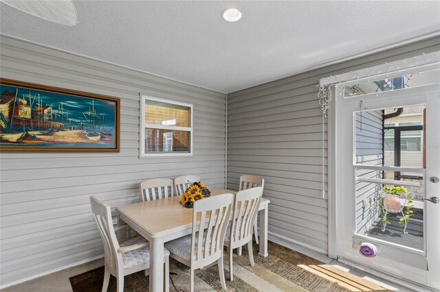 dining room with carpet floors