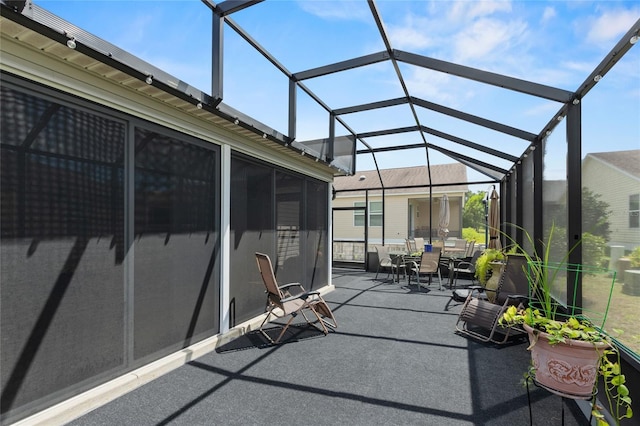 view of patio with a lanai