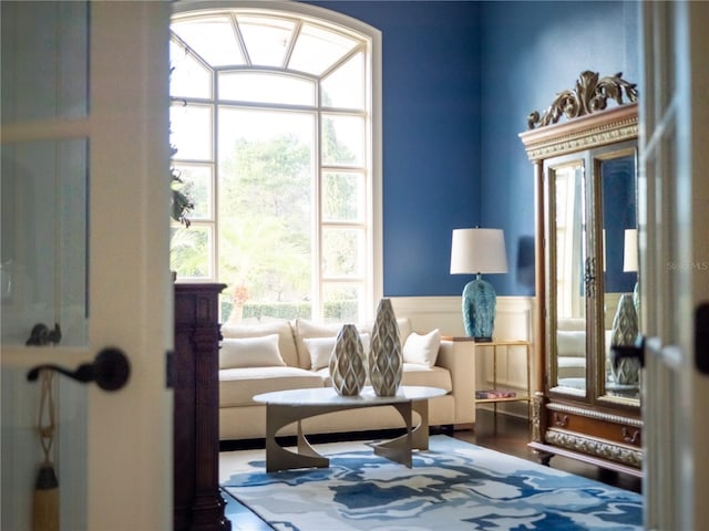 sitting room with hardwood / wood-style floors