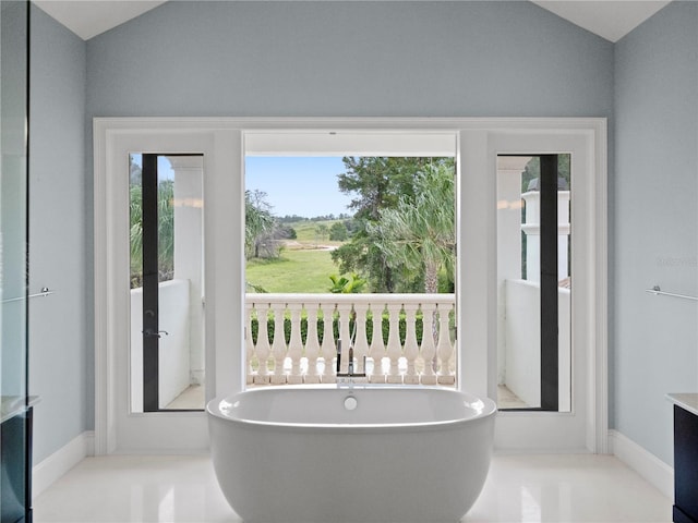 bathroom with a tub to relax in