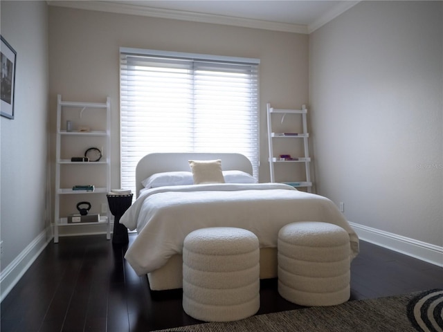 bedroom with ornamental molding and dark wood-type flooring