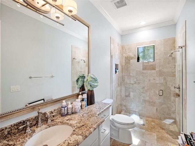 bathroom featuring vanity, toilet, ornamental molding, and walk in shower