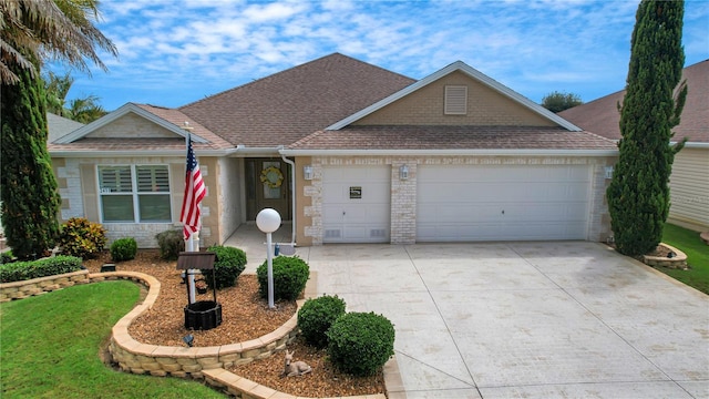 single story home featuring a garage