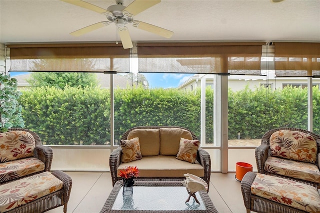 sunroom with ceiling fan