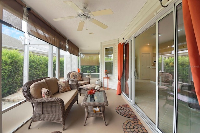 sunroom with ceiling fan and a healthy amount of sunlight