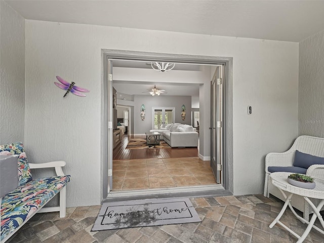 entrance to property featuring french doors