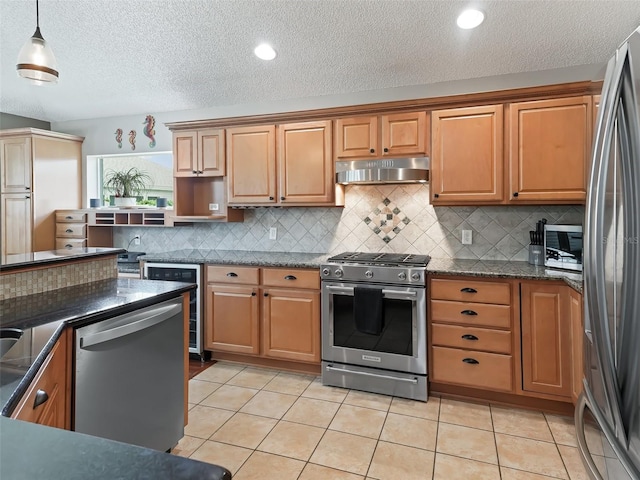 kitchen with wine cooler, pendant lighting, light tile patterned floors, backsplash, and stainless steel appliances