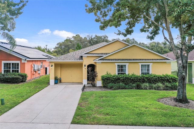 ranch-style house with a front yard and a garage