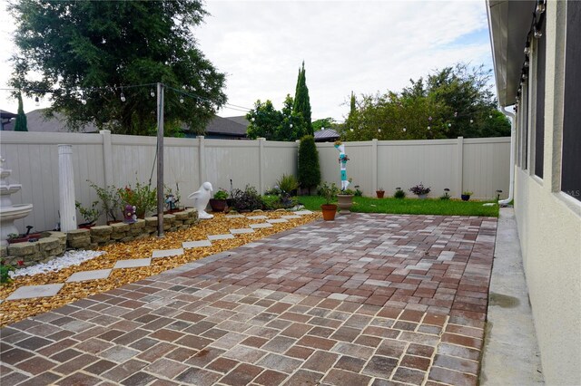 view of patio featuring a fenced backyard