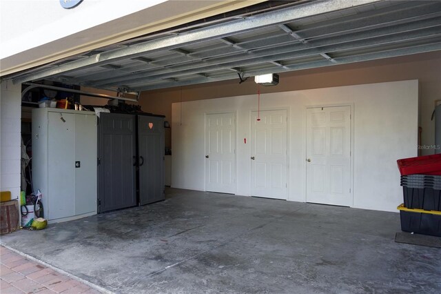 garage featuring a garage door opener