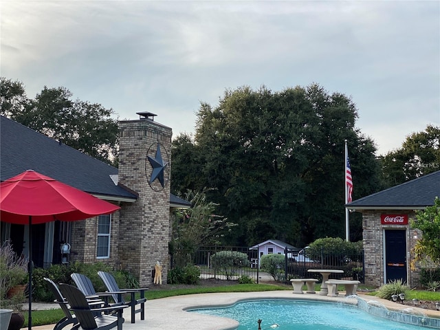 view of pool featuring a patio