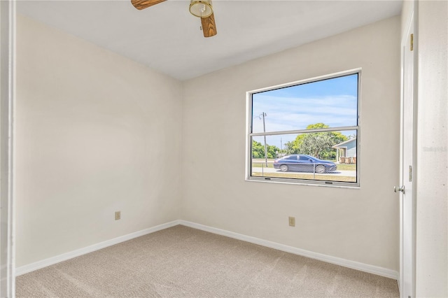 19402 E 5th St, Umatilla, FL 32784 - empty room featuring carpet flooring, baseboards, and ceiling fan